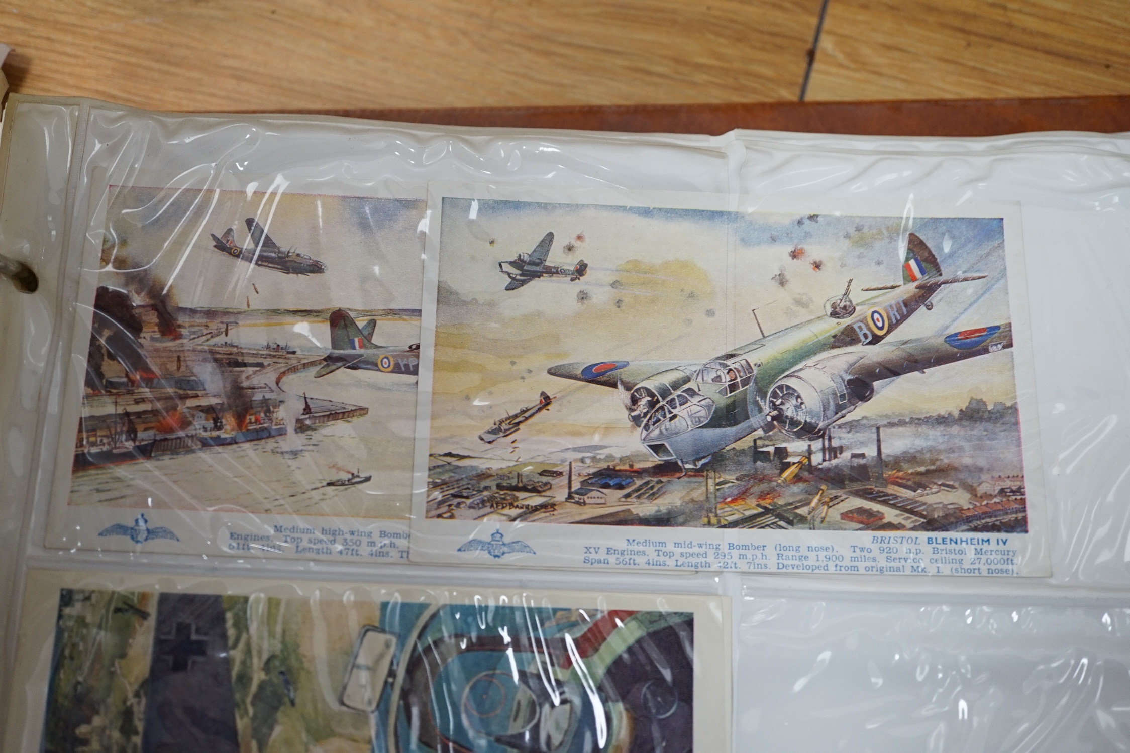 A postcard album with contents including WWI and WWII postcards. Condition - stored in damp location